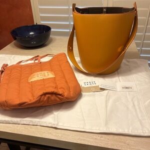 Brand NWT DANSE LENTE tan bucket bag. Never used!